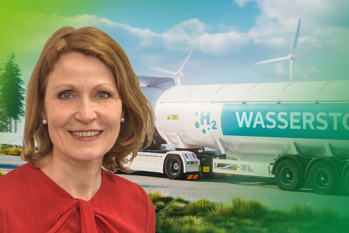 Eine Portraitaufnahme von Silke Wesselmann vor einem Wasserstoff-Tanklastwagen